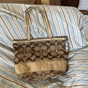 MAKE AN OFFER COACH GOLD BAG